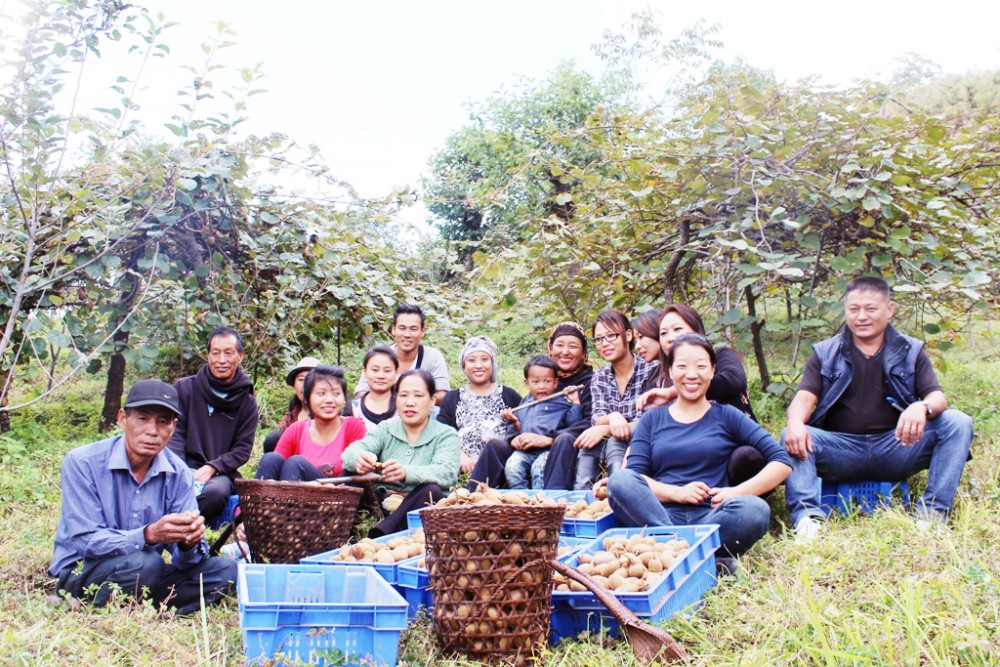 Rekha Rose Dukru (second from right) at Eden farm with her family members.